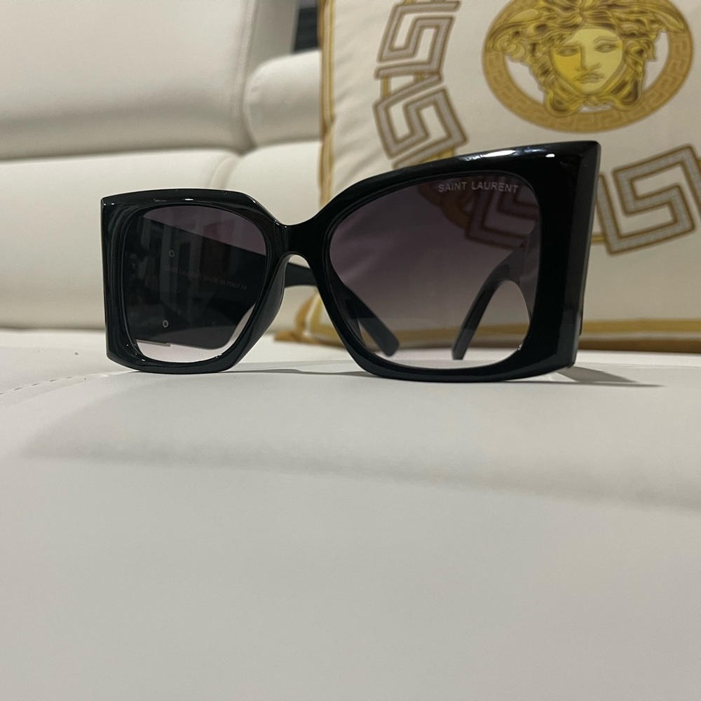 Absolutely beautiful YSL Sunglasses - just like new. Has case.  No scratches
